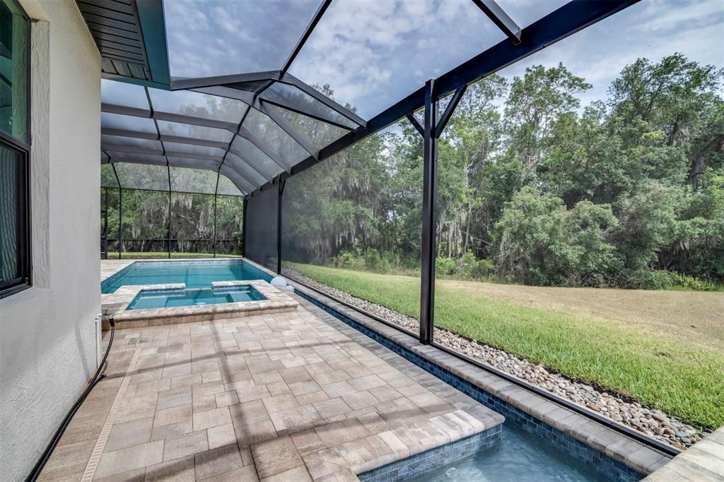 The water from the waterfall feature flows down the trough to the main pool. This creates a current in the main pool.