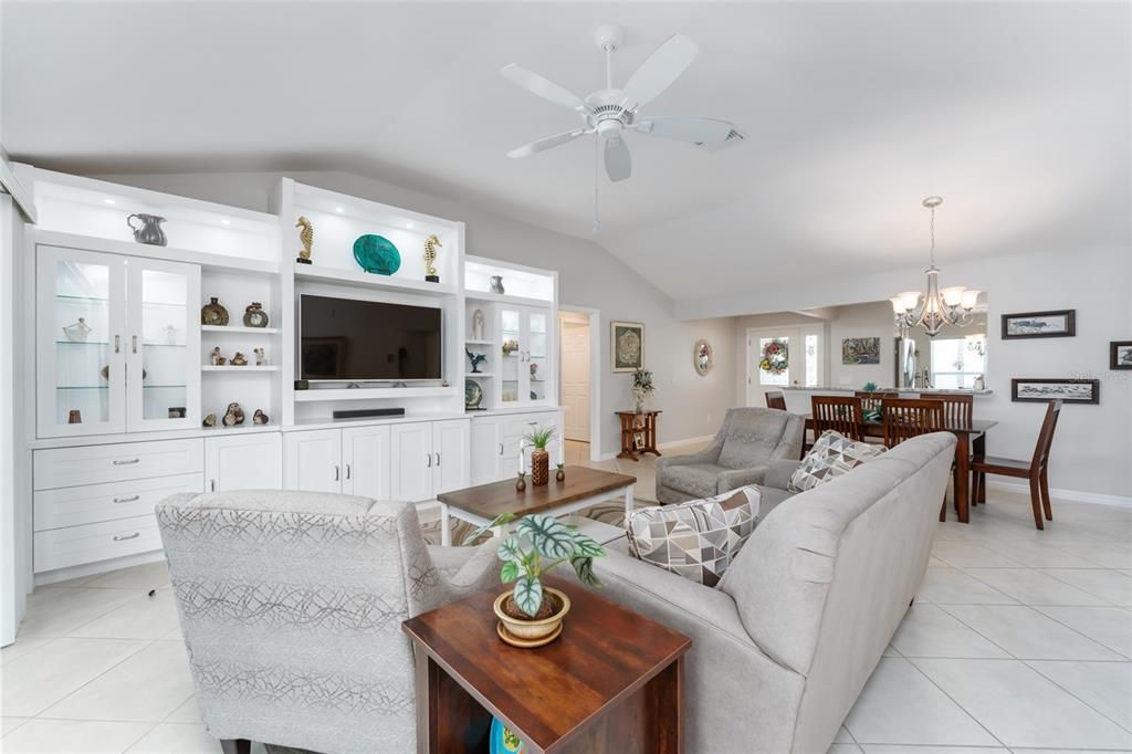 LIVING ROOM with view of BUILT IN ENTERTAINMENT CENTER