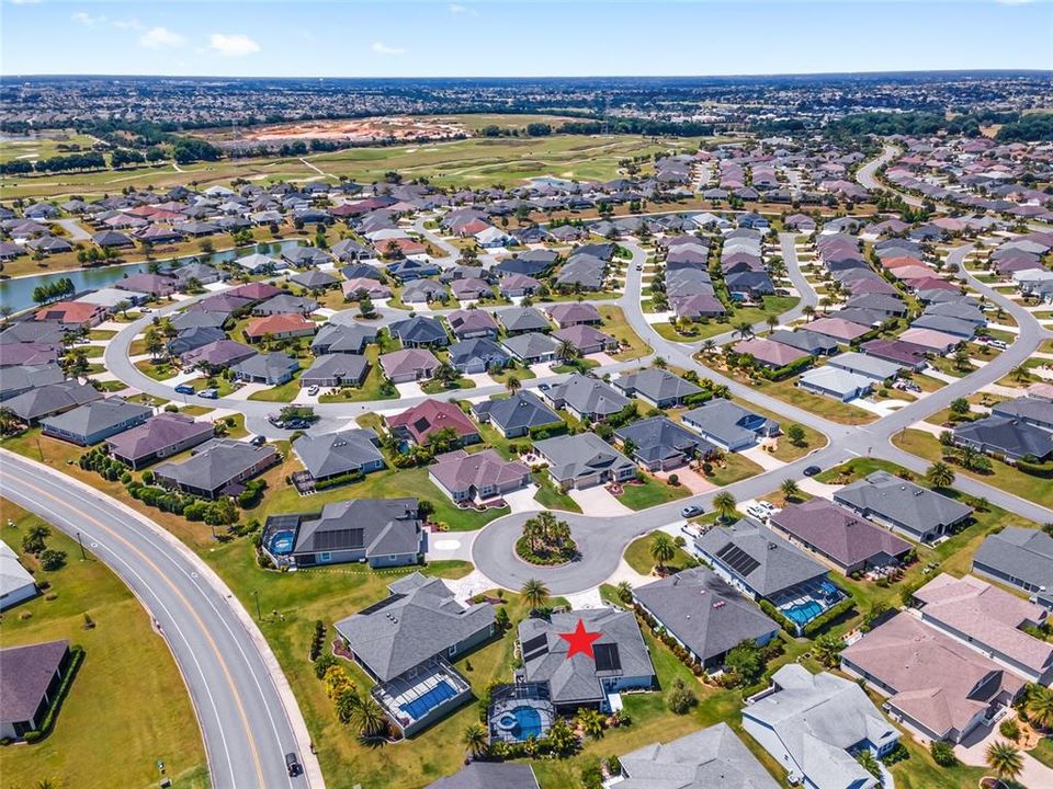 AERIAL looking West - Escambia, Okeechobee, and Volusia Executive GCs (left center), Colony Commercial Corridor (top R on horizon)