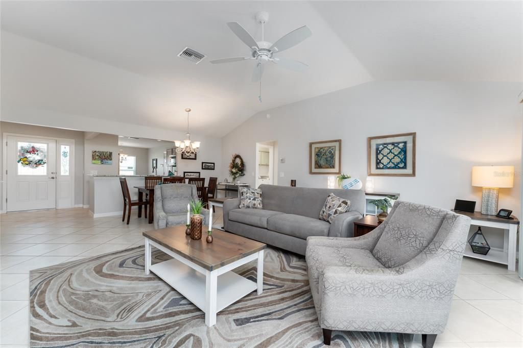 LIVING ROOM View shows VAULTED CEILING w/ KNOCKDOWN TEXTURE