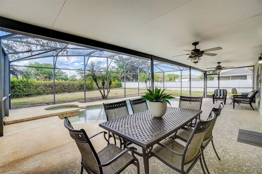 Spacious covered lanai & screened in pool with a spa!