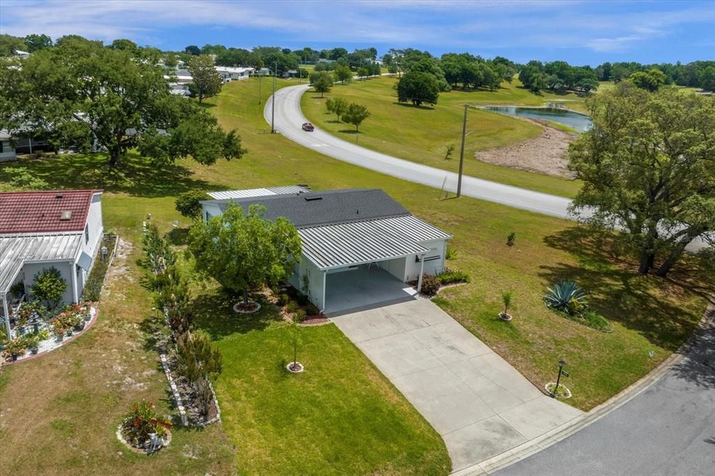 Overhead view of Large Corner Lot overlooking Lake and Golf Course