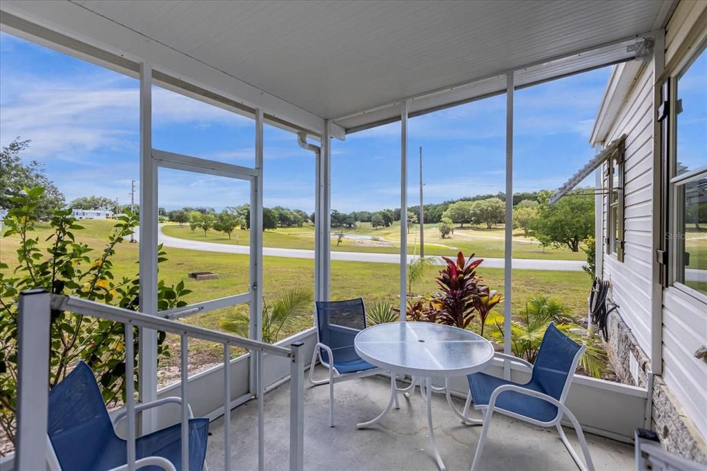 Screened Porch overlooking Golf Course and Lake