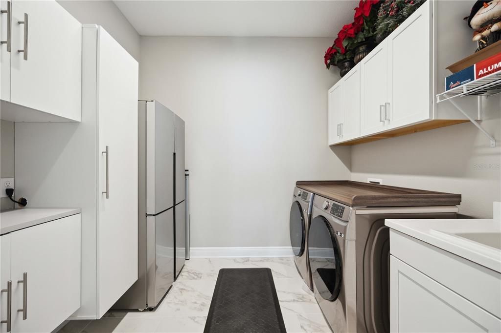 Laundry room with 2nd refrigerator and coffee bar