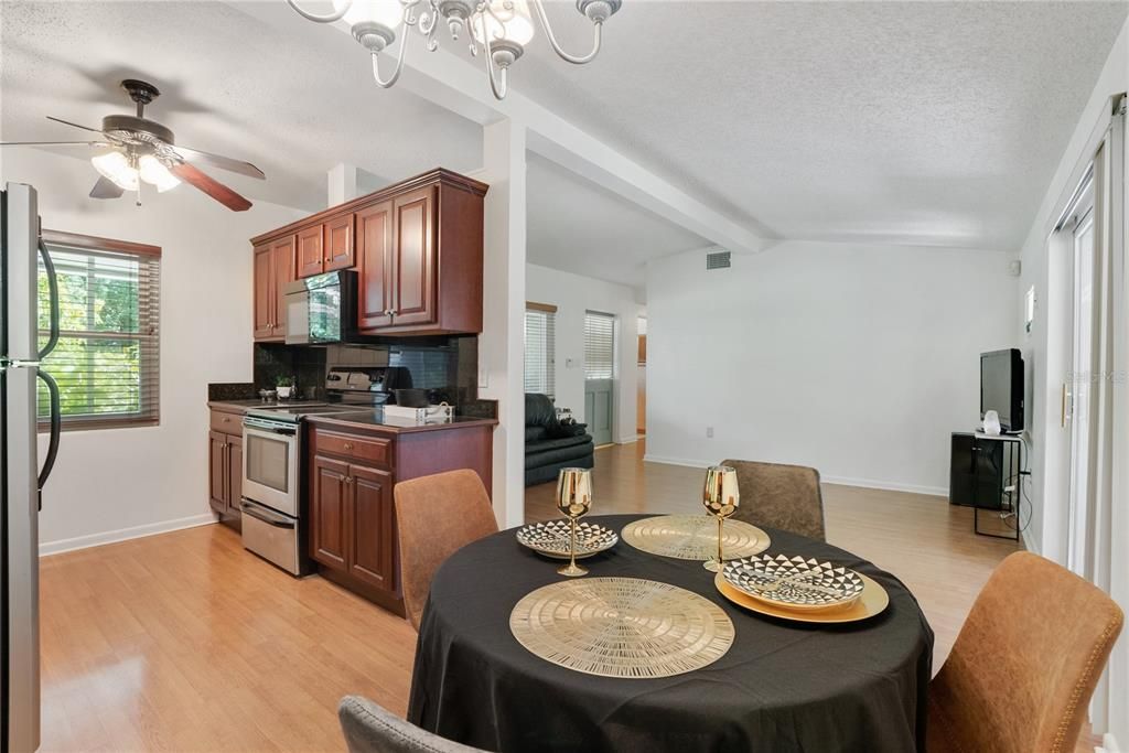 Stay connected with guests from kitchen to dining area.