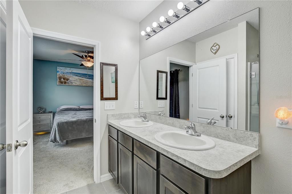 Primary bathroom with double sink vanity