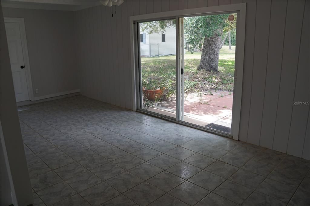 Family room with tile flooring