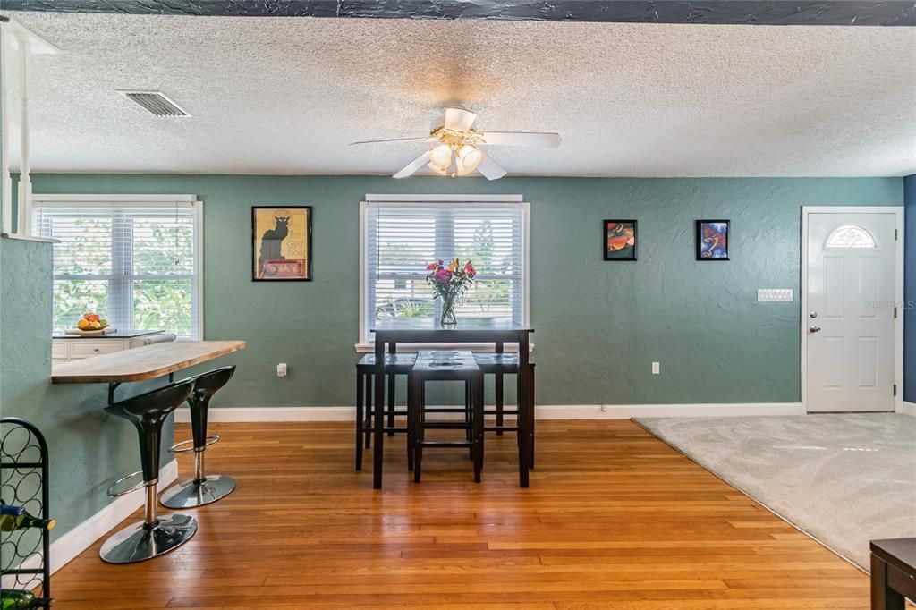 dining area open concept with neutral painted walls