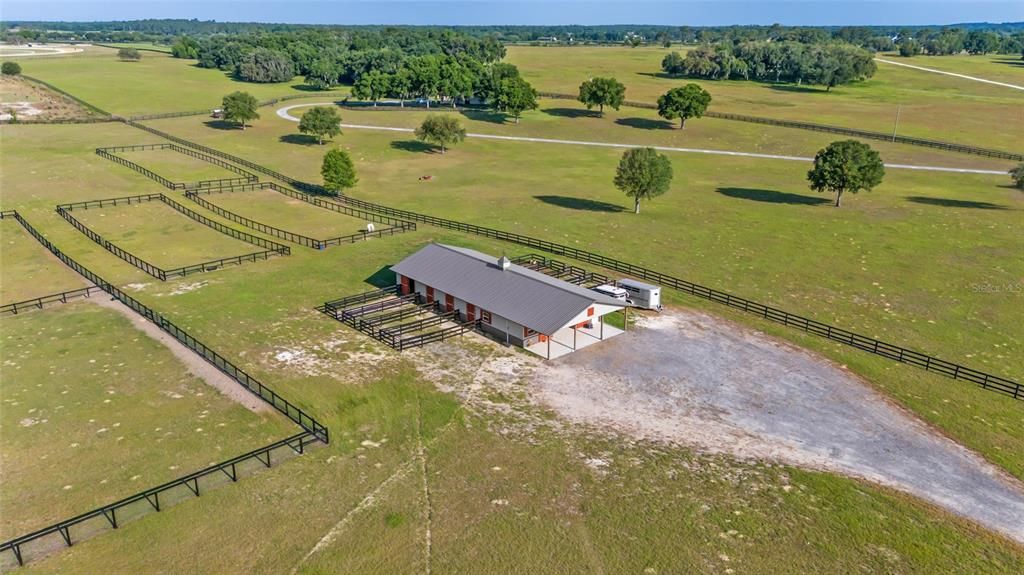 Overhead shot of barn and paddocks from SE