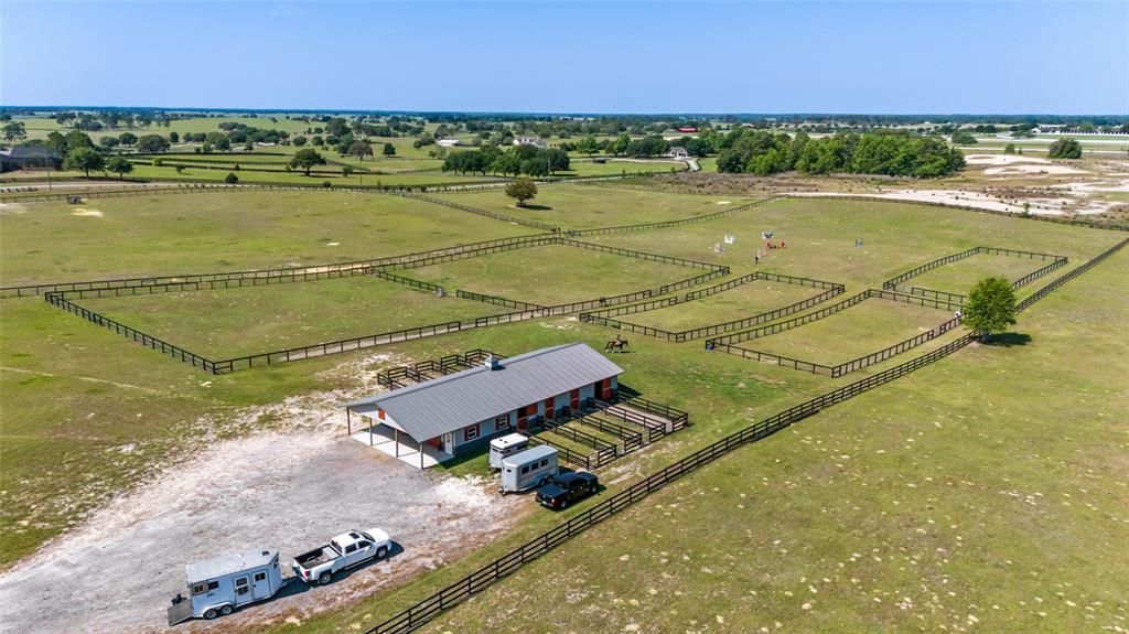 Overhead view of barn and paddocks from NE.