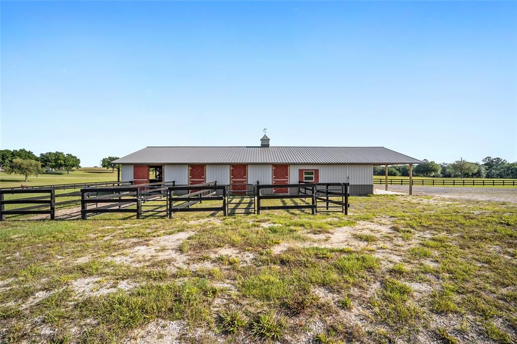 Side view of barn with run-ins.