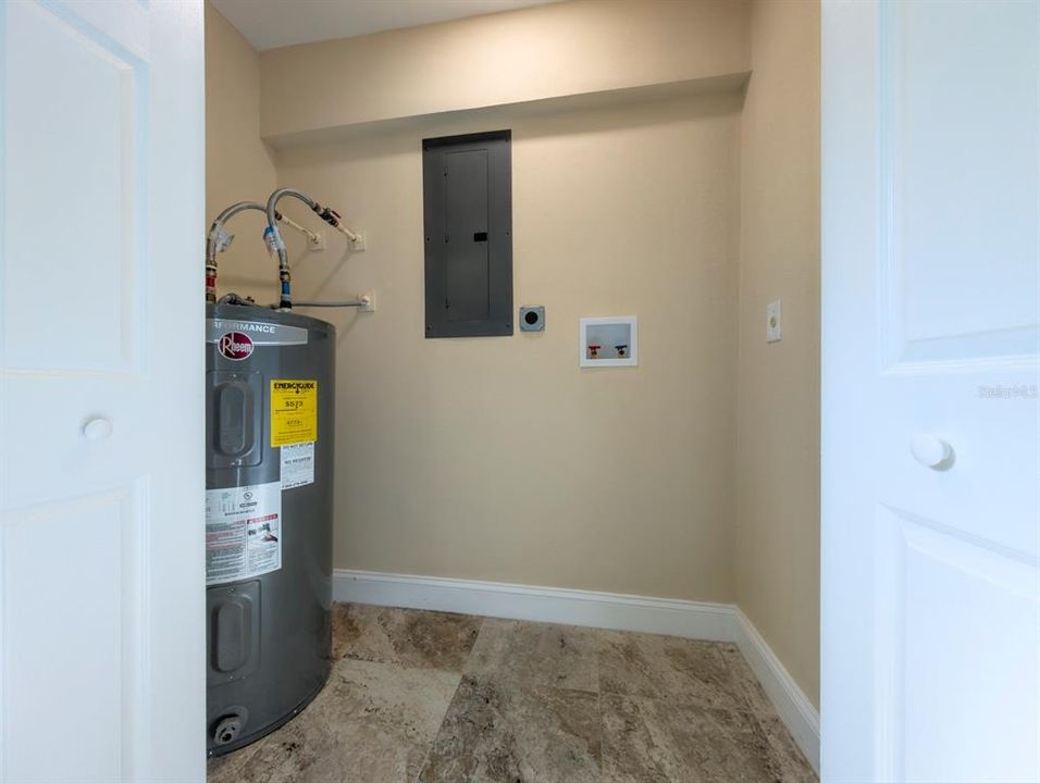 Water heater and laundry room