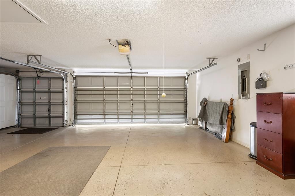 20 ' deep garage with golf cart garage and workshop space