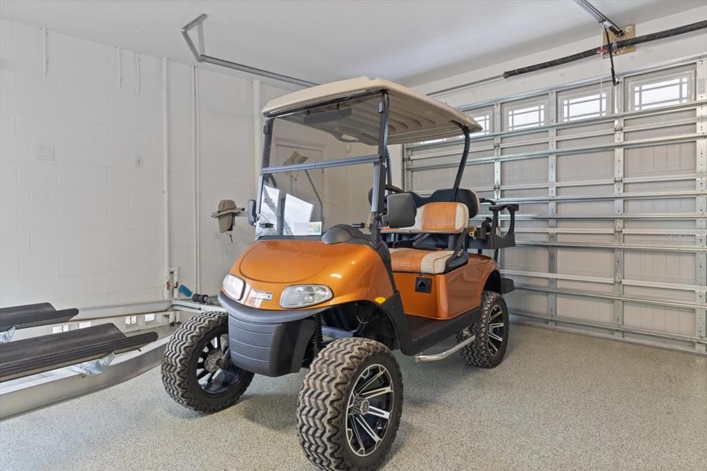 2016 EZ GO Golf cart is included! Ride to 3 different waterfront tiki bars & restaurants in this golf-cart friendly community
