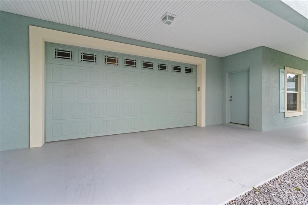 2 car garage with side entry into additional storage area