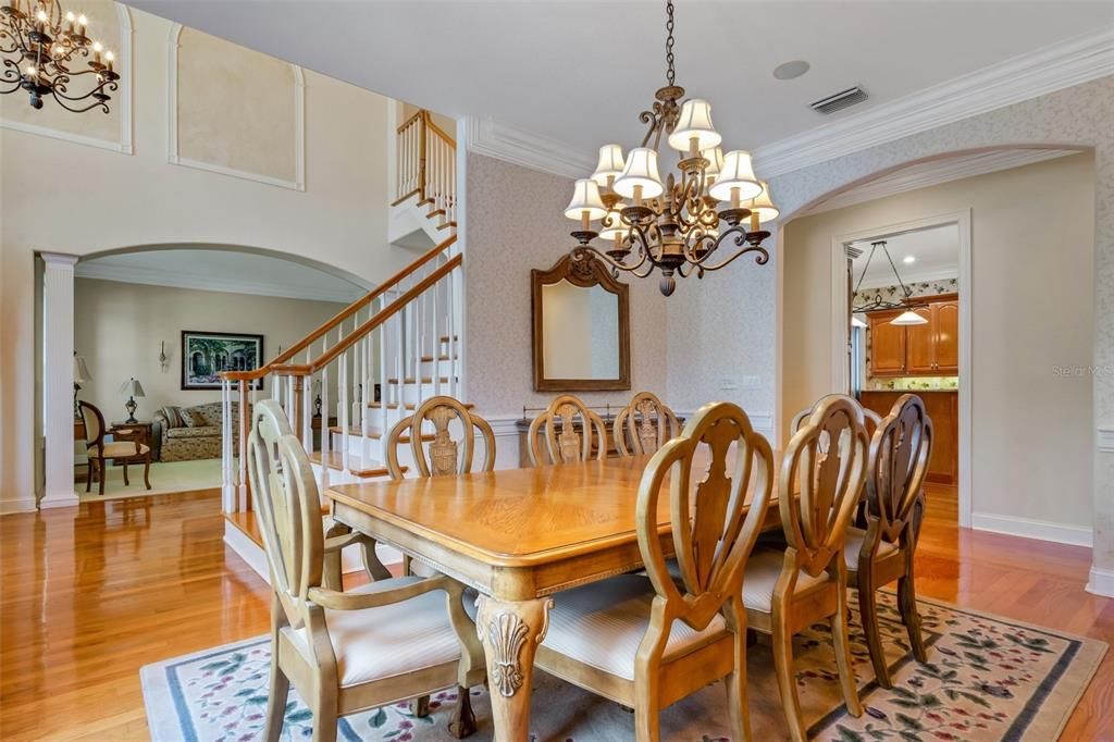 The formal dining room also flows seemlessly into the kitchen for easy entertaining