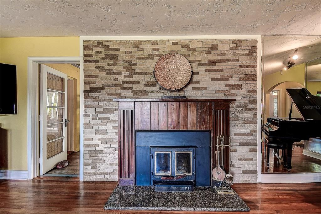 Wood burning fireplace with wood stove insert