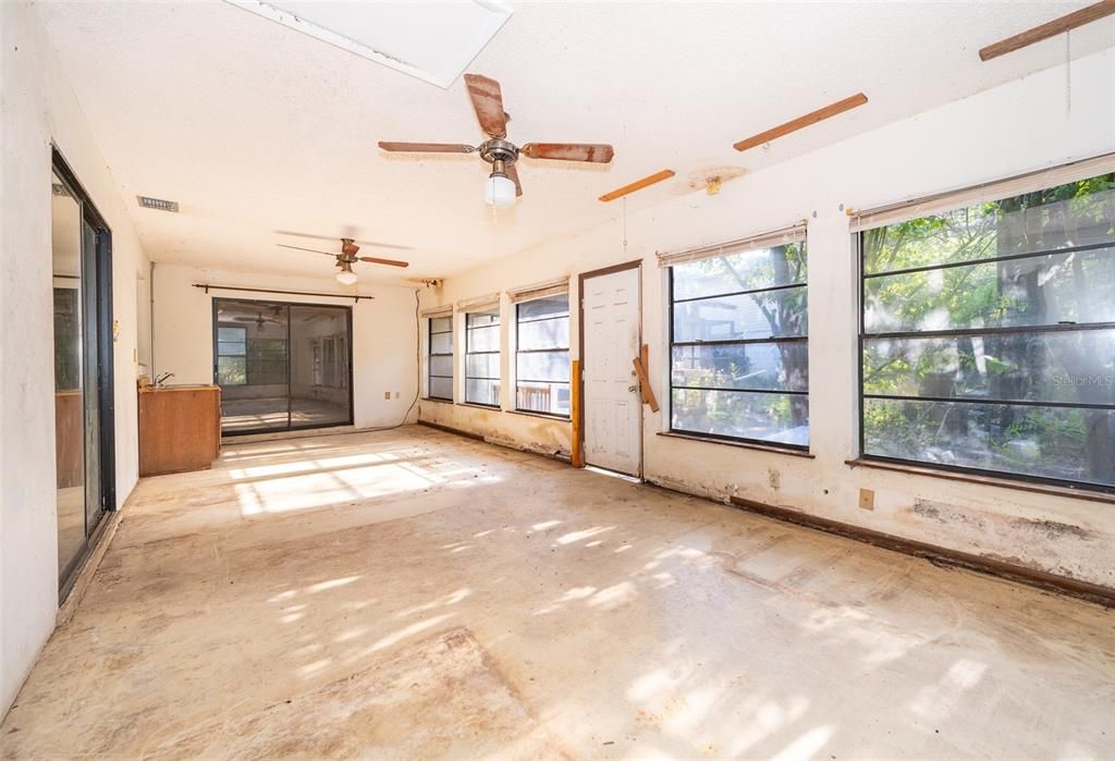 sunroom off living room and dining room