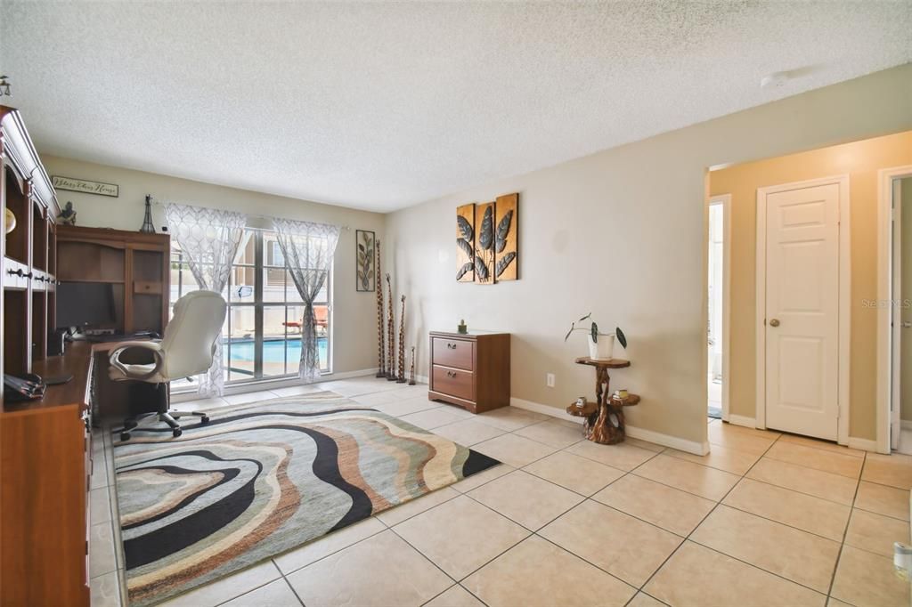 Formal Living Room and Hall leading to additional bedrooms