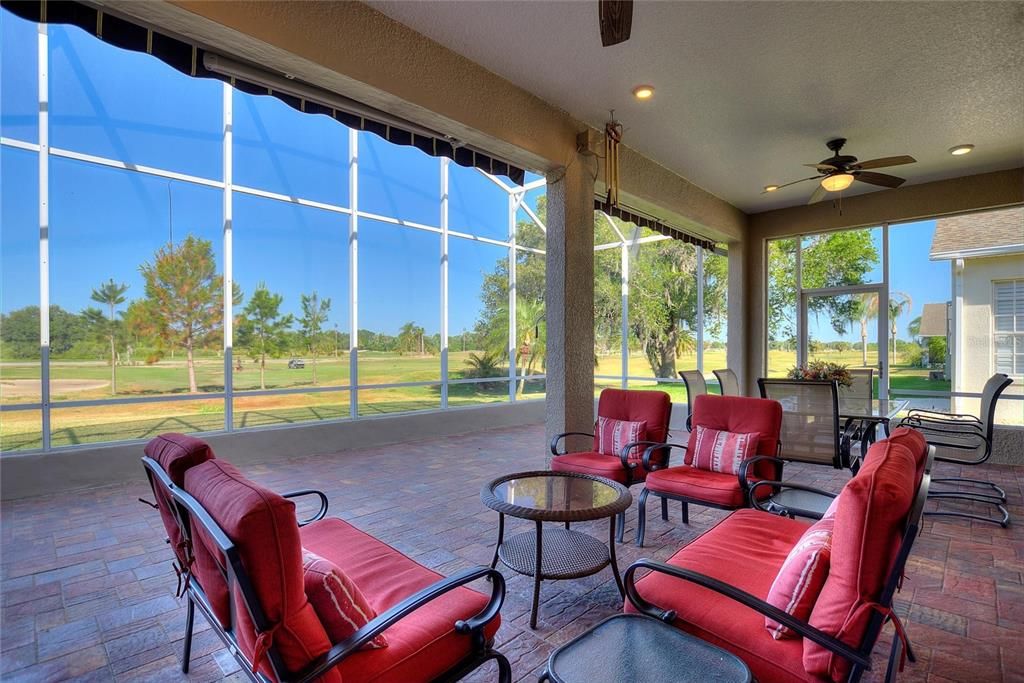 600+ SF screened lanai with retractable awnings & brick paver floor