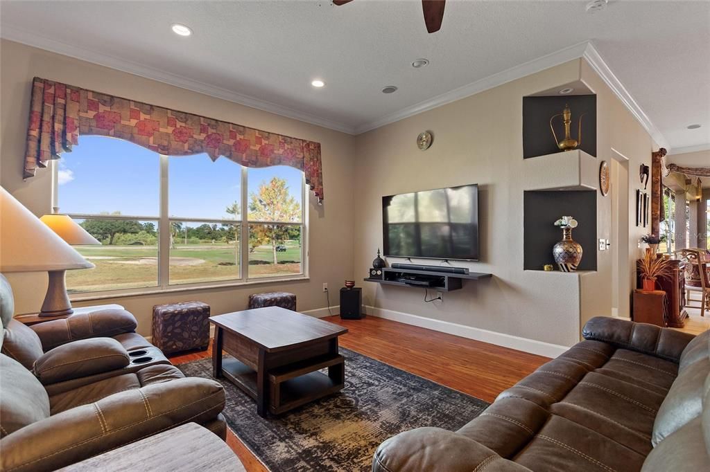 Family room overlooks golf course