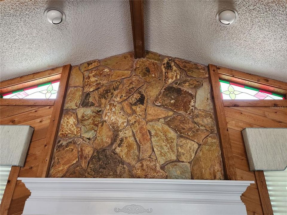 LIVING RM HEARTH & STAINED GLASS SKYLIGHTS