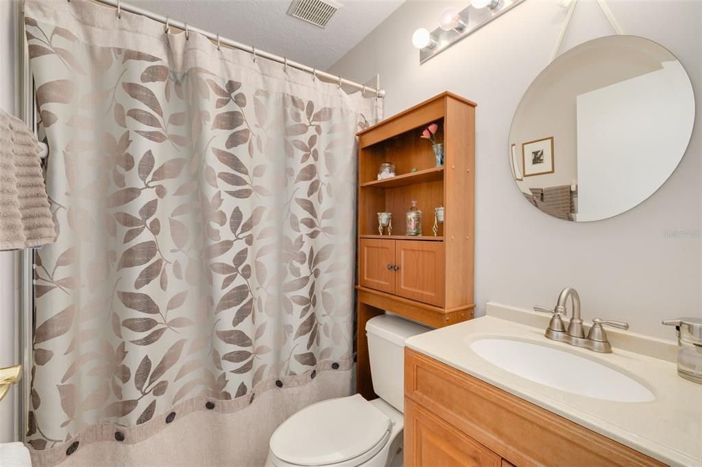 Bathroom 3 with patio/pool deck access nearby.