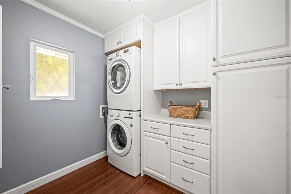 Laundry Room with lots of storage and built in ironing center