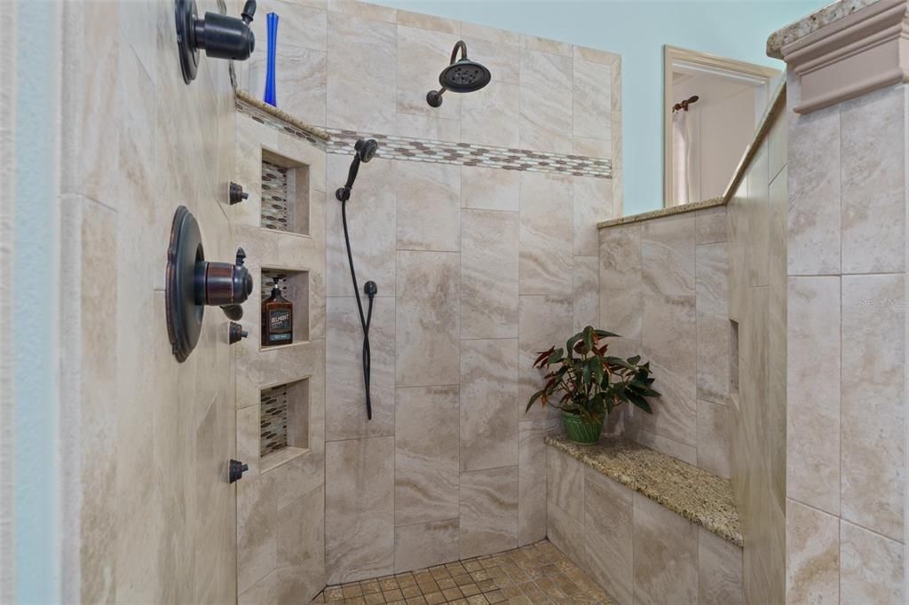 Master shower-custom designed with easy clean up.