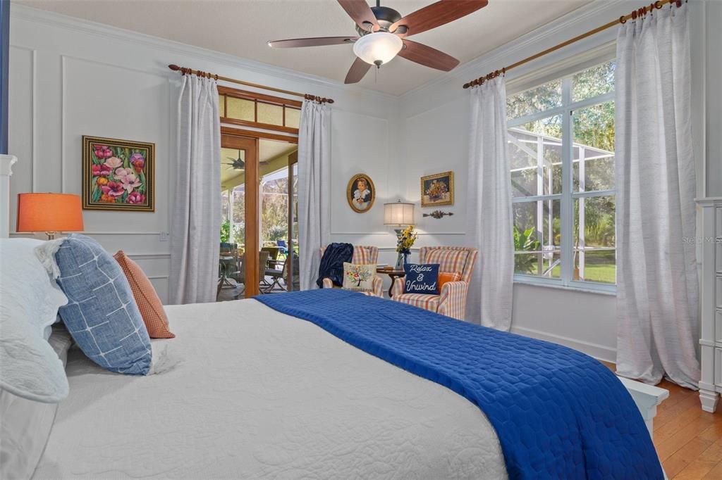 Master suite. Double French doors lead to lanai and pool.