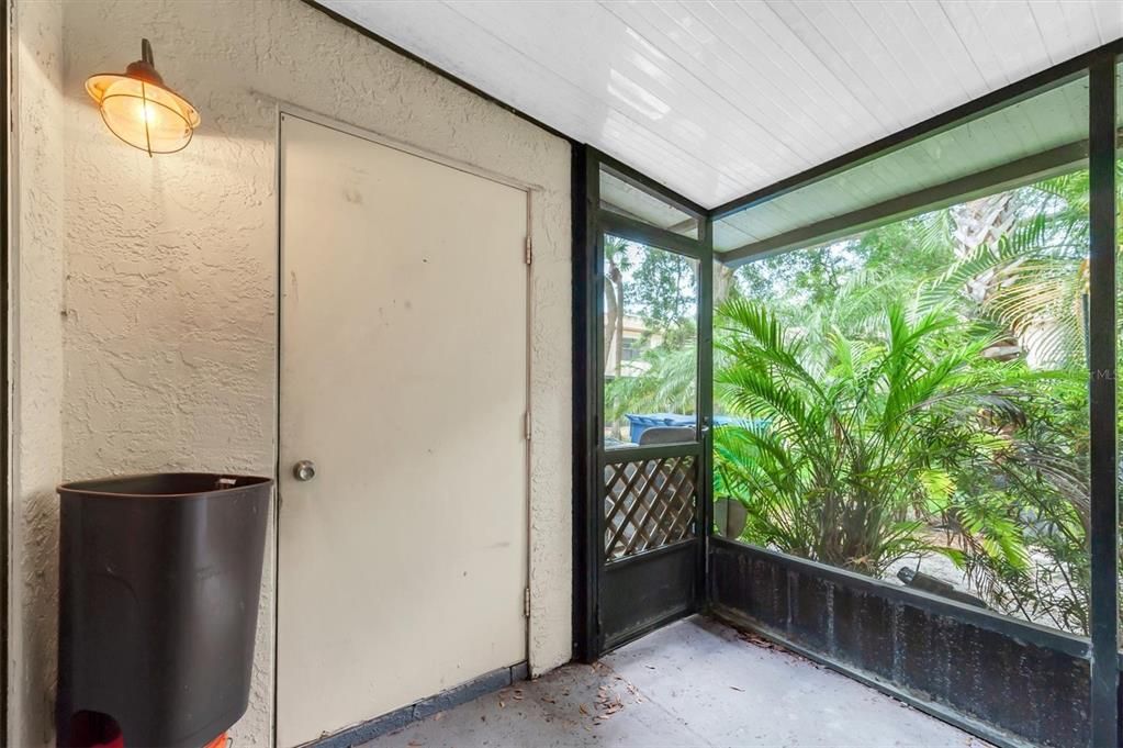 the back screened patio; laundry and utility closet thru the solid door; washer/dryer included