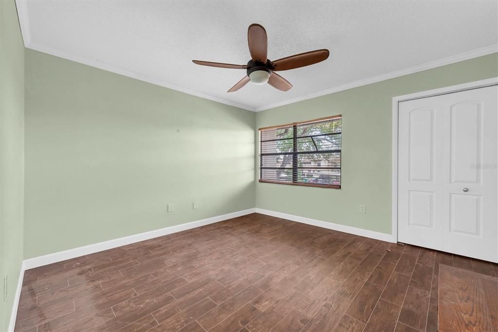 front bedroom upstairs; big closet behind the white doors on the right