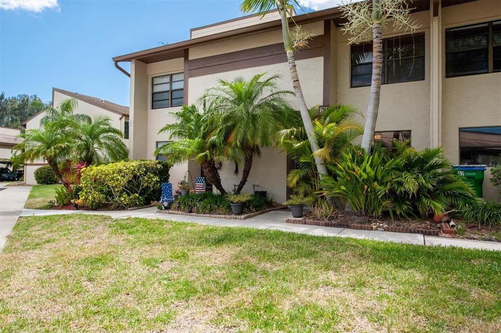 #63 is second door from the left; there's a really cute little front patio behind the two palm trees