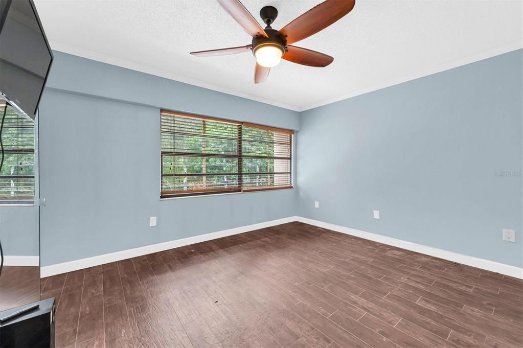 another angle view of the back bedroom upstairs, overlooks the green space