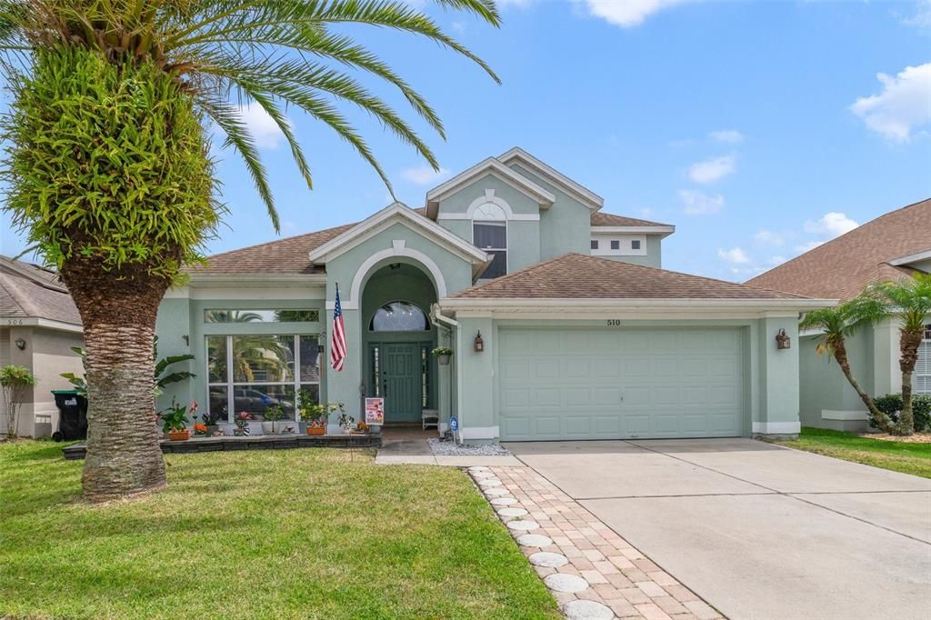 The sought-after Waterford Chase Village Community in Orlando has a beautiful 4BD/2.5BA **POOL HOME** with TONS OF UPDATES and WATER VIEWS!