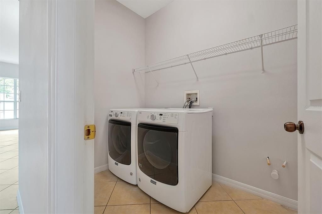 Large Laundry room on first floor off kitchen for convenience.  Plenty of room and plumbed for sink.