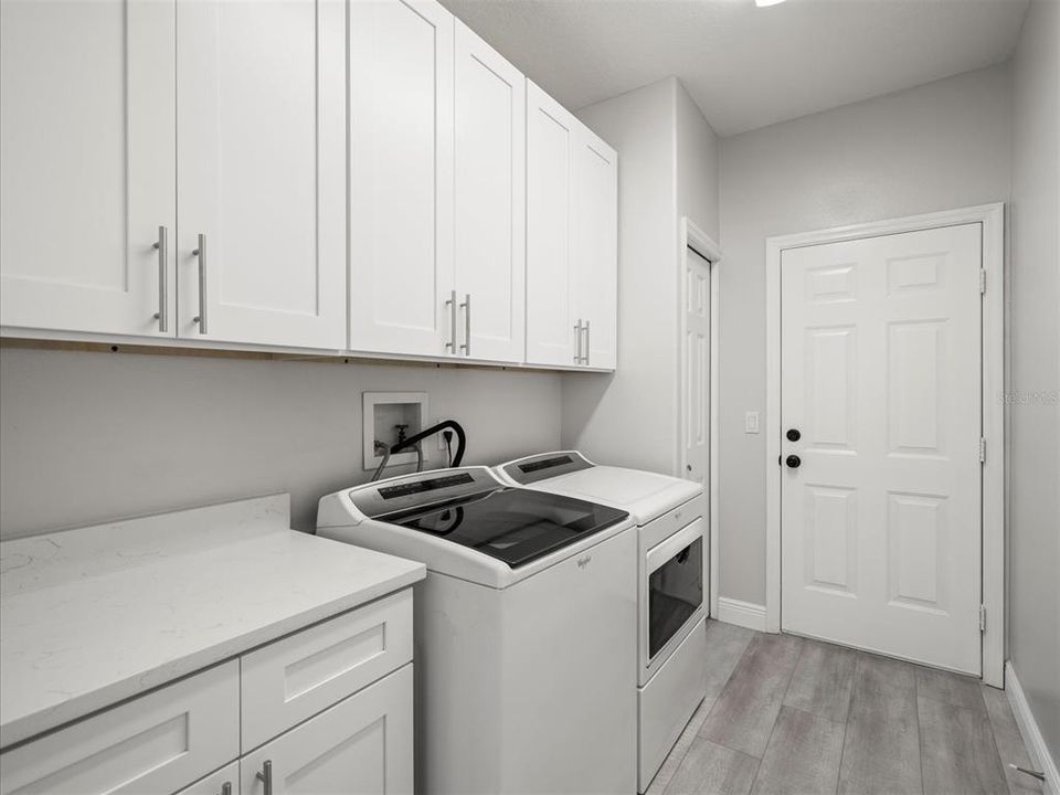 Laundry Room between Kitchen and Garage