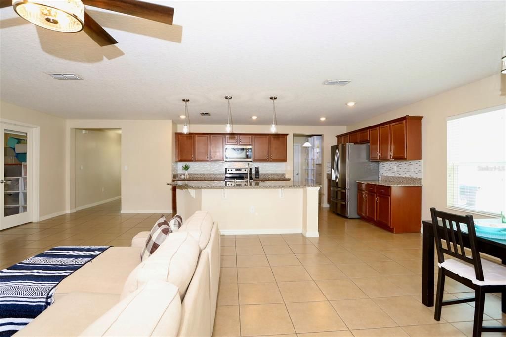 Open Floor Plan.  Kitchen, Living Room, and Dining Room View.