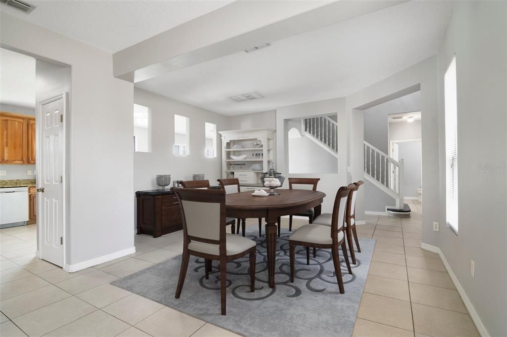 There are versatile formal living and dining spaces before the natural flow brings you into a spacious EAT-IN KITCHEN and the family room beyond. Virtually Staged.