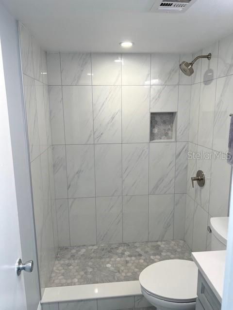 Glass-Enclosed Tile Shower