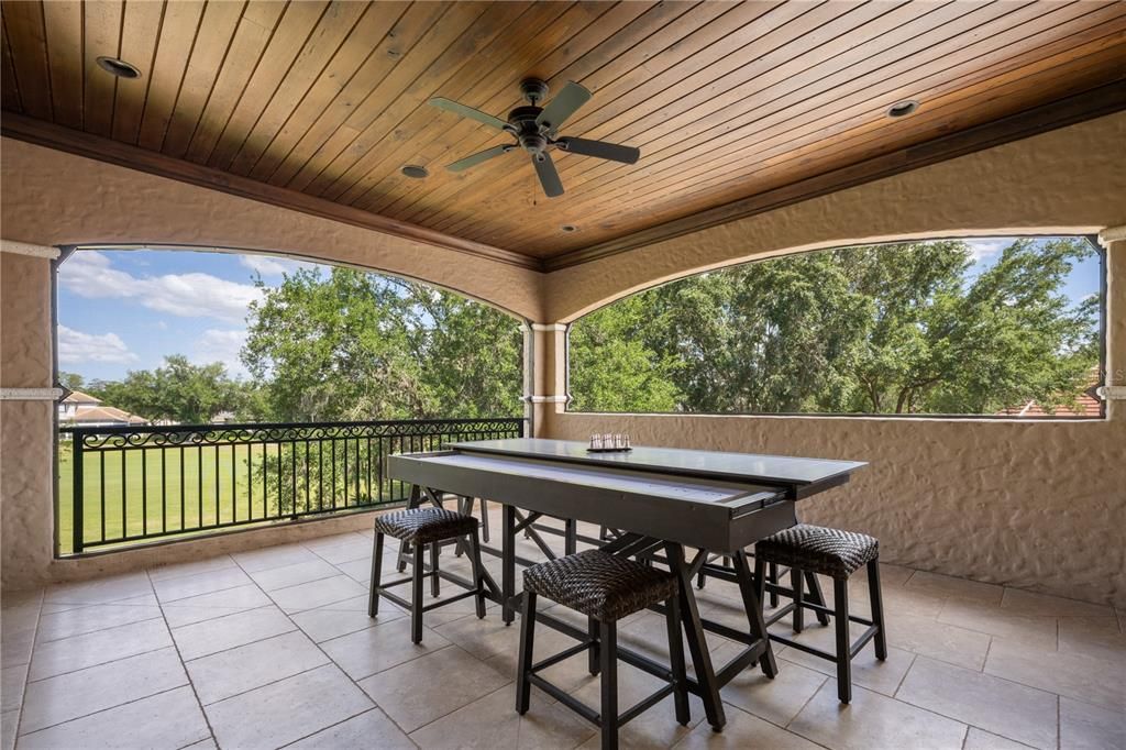 Balcony is screened and accessible from Game Room