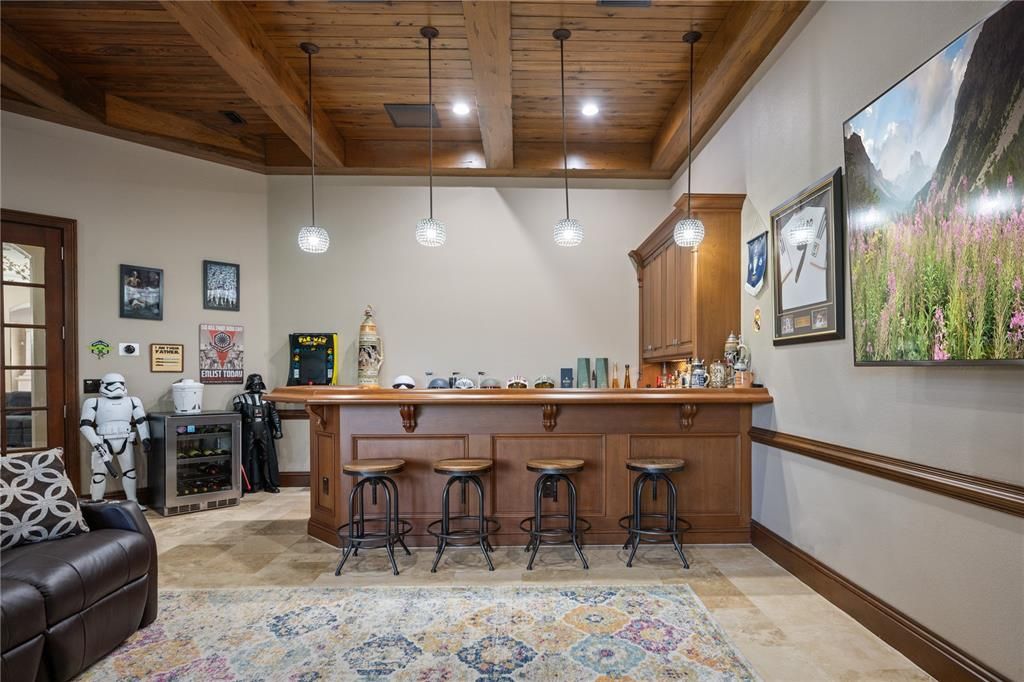 Game/Media Room Bar has dishwasher, wine fridge & beverage center