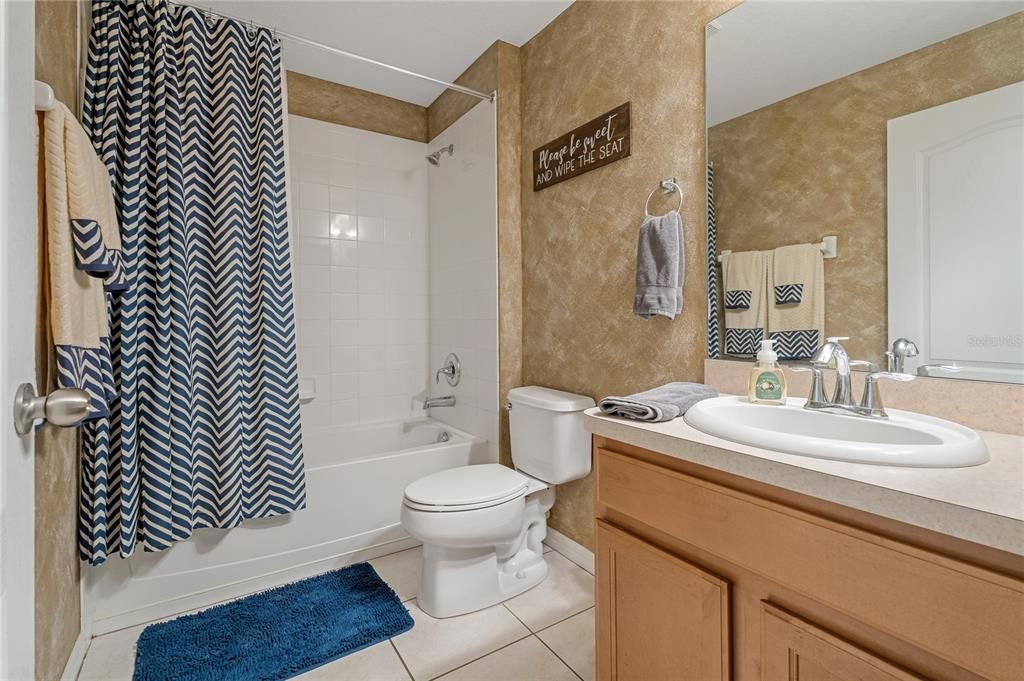GUEST BATHROOM WITH SHOWER TUB COMBO!