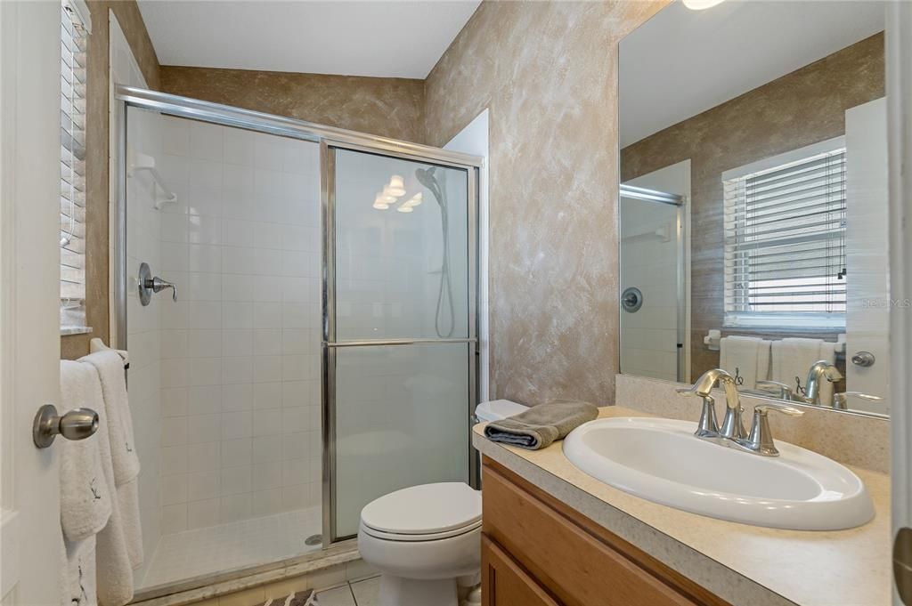 PRIMARY BATHROOM WITH WALK IN SHOWER!