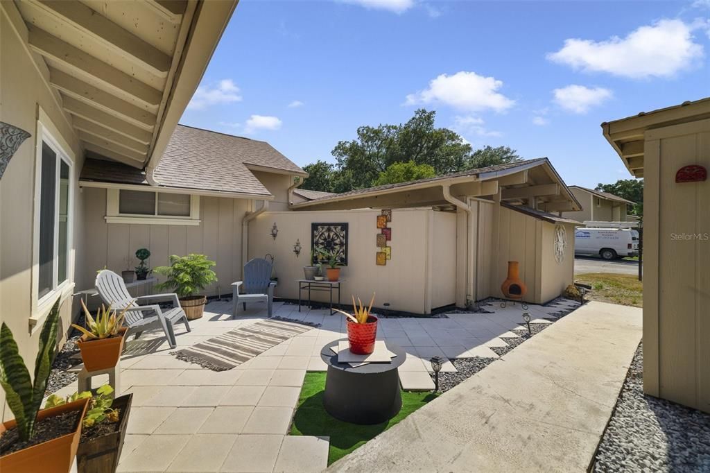 In addition to the screened lanai there is also a large courtyard patio for your choice of outdoor spaces!