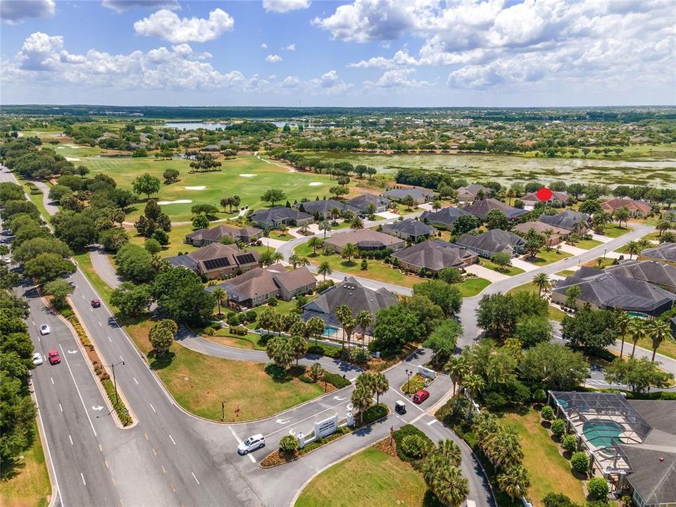 AERIAL - Looking SE - CR 466 (left), Bridgeport @ Laurel Valley entrance (front center), Lake Sumter Landing (deep center)