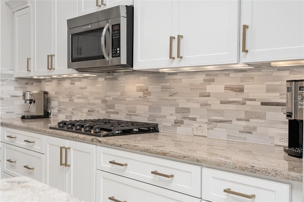 KITCHEN features cabinet UNDERLIGHTING.