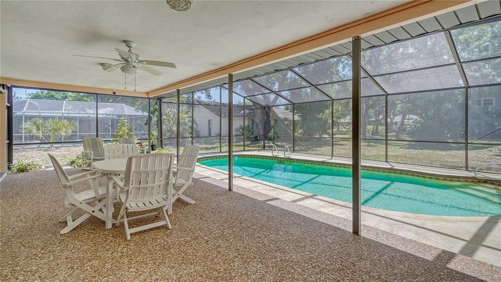 Large shaded rear lanai has plenty of room for pool lounges, an outdoor dining set and additional seating, if needed.