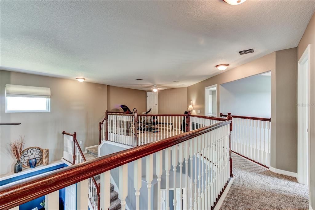 Pretty railing along the hallway upstairs.