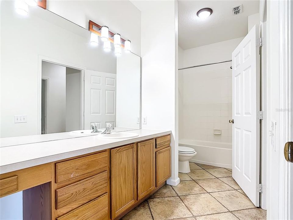 Guest Bath with direct access from guest room 3 6084 Stevenson Dr, Unit 105, Orlando, FL 32835